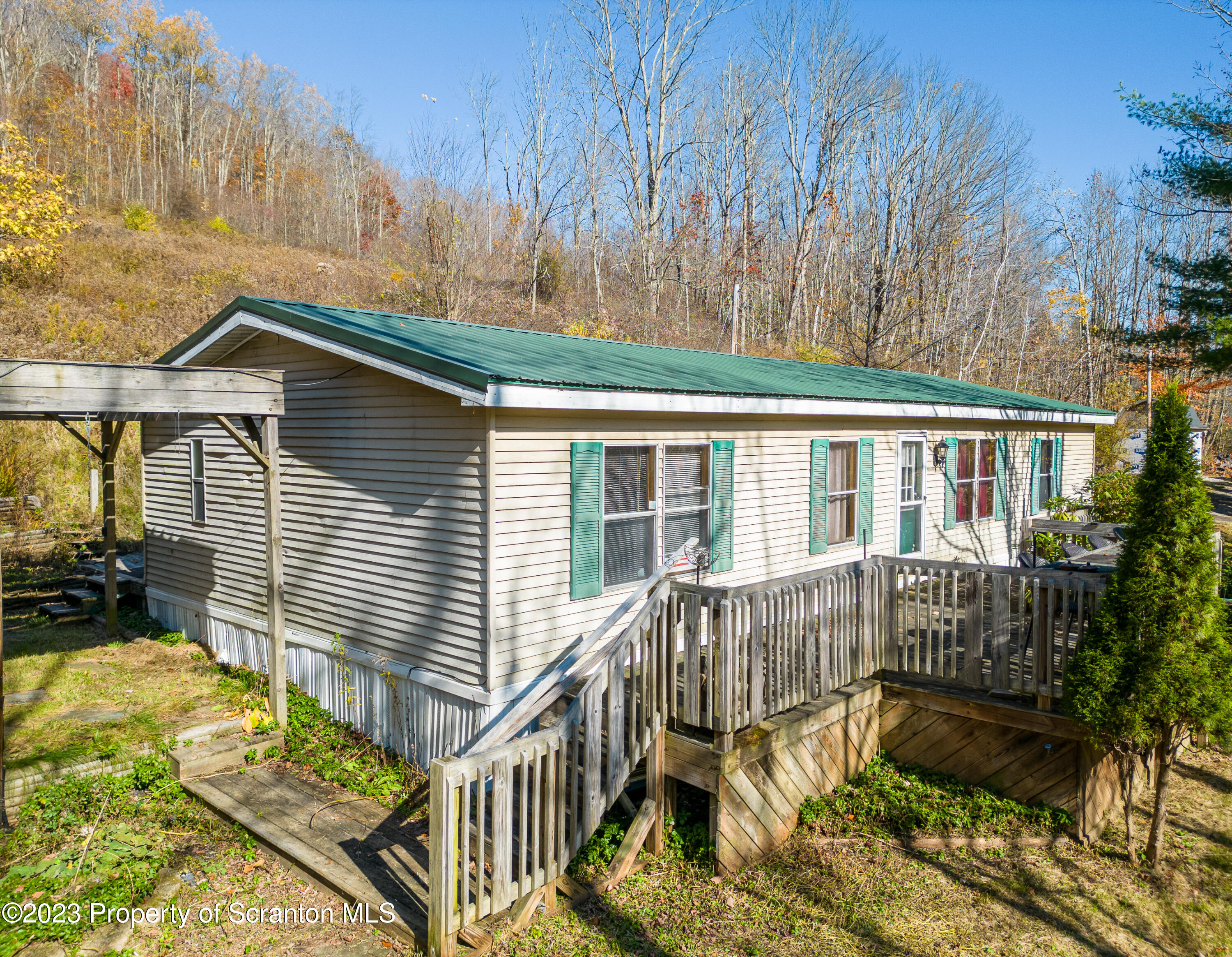 3489 Silver Creek Road Montrose, PA 18801 - Photo 6 of 35 a view of house with a chairs in patio
