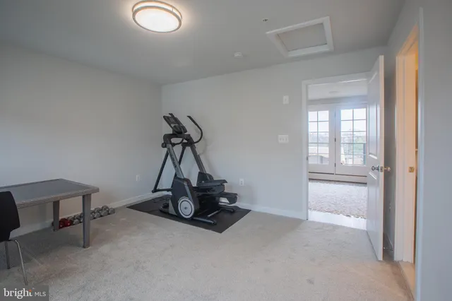 a view of a room with gym equipment