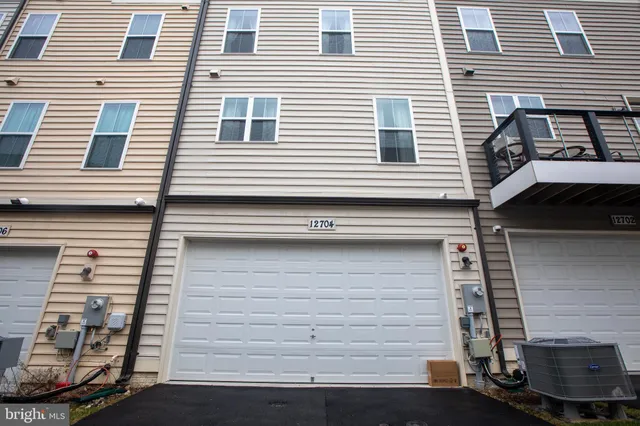 a view of a house with a garage
