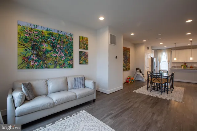a living room with furniture and a couch