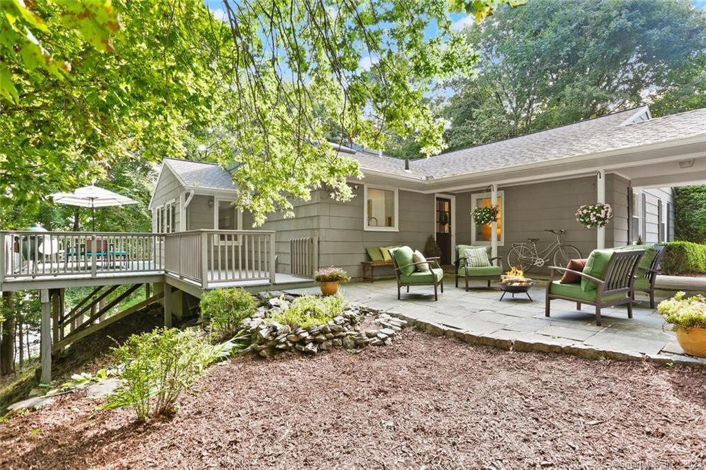 78 Hillandale Road Westport, CT 06880 - Photo 1 of 1 a view of a dinning table and chairs in patio