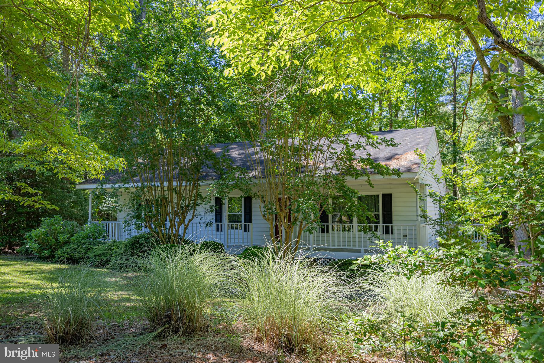 89 Club View Drive Lancaster, VA 22503 - Photo 2 of 25 a view of a house with a tree