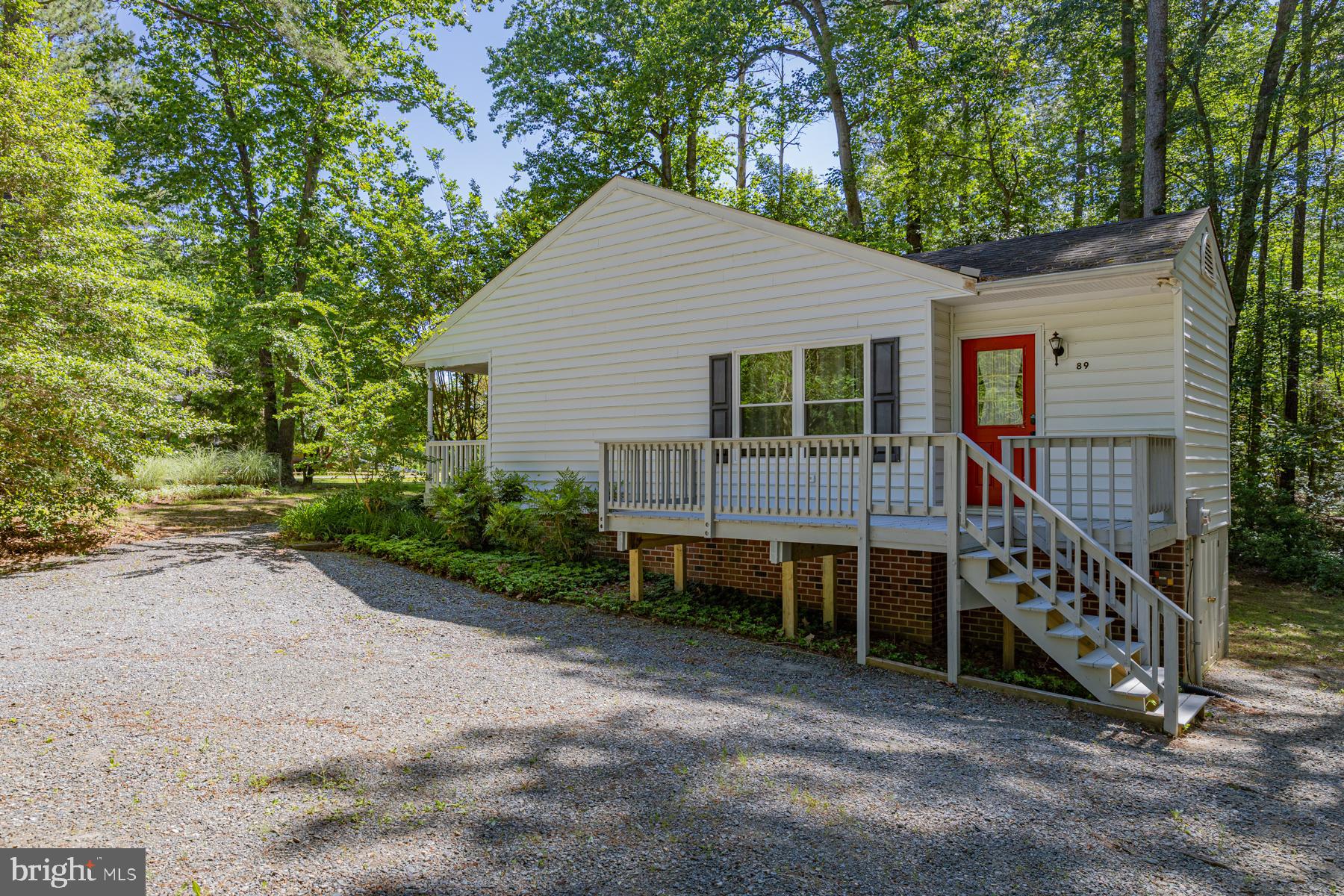 89 Club View Drive Lancaster, VA 22503 - Photo 3 of 25 a view of a house with a yard