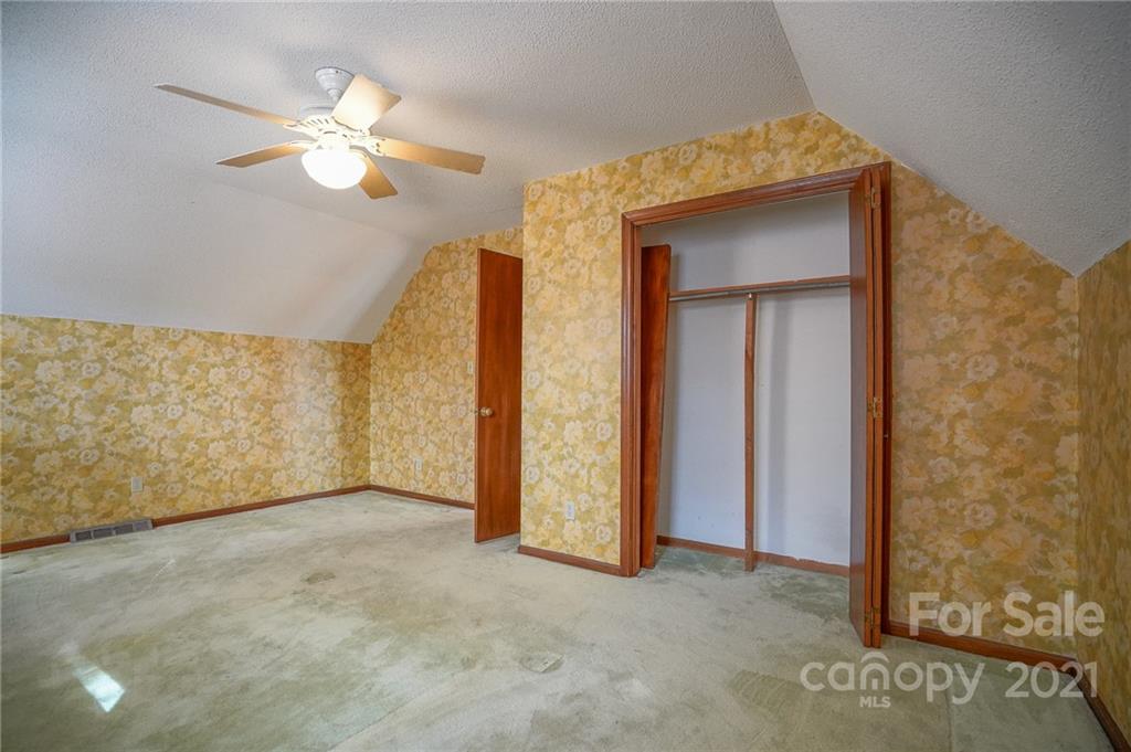 640 Coley Road Salisbury, NC 28146 - Photo 12 of 43 a view of an empty room with wooden floor