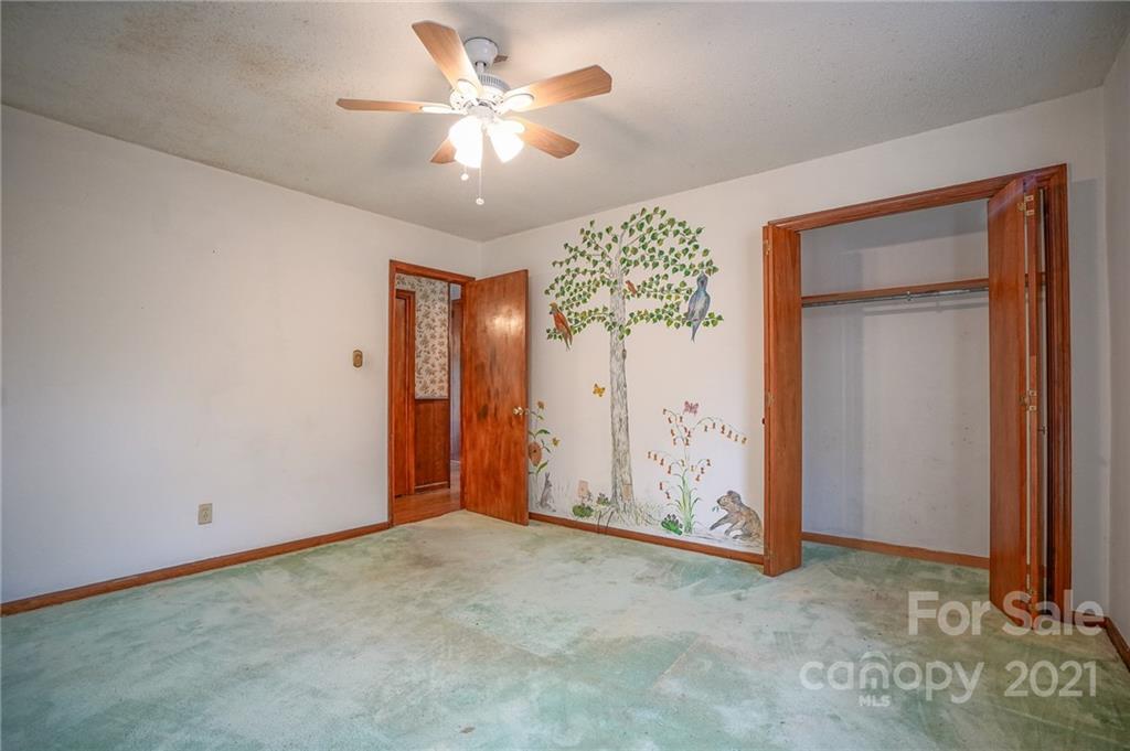 640 Coley Road Salisbury, NC 28146 - Photo 21 of 43 an empty room with chandelier fan
