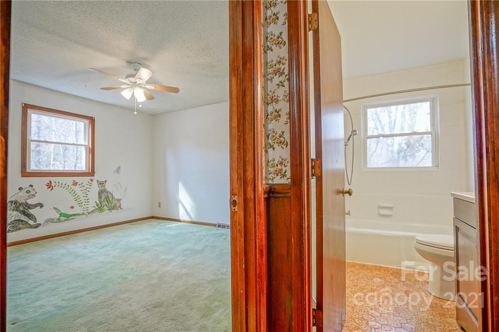 640 Coley Road Salisbury, NC 28146 - Photo 23 of 43 an empty room with windows and closet