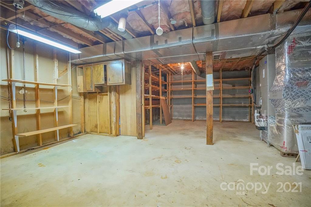 640 Coley Road Salisbury, NC 28146 - Photo 4 of 43 a view of an empty room with wooden walls