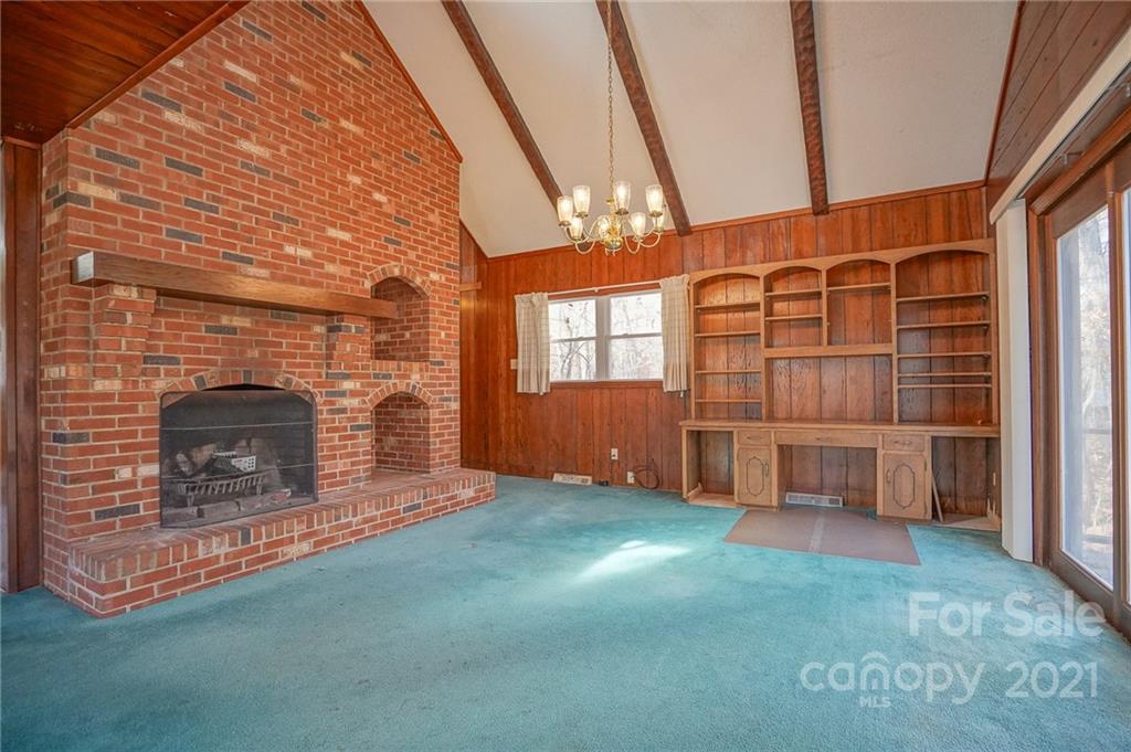640 Coley Road Salisbury, NC 28146 - Photo 32 of 43 a view of an empty room with a fireplace