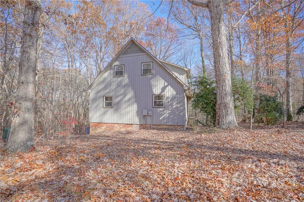 640 Coley Road Salisbury, NC 28146 - Photo 36 of 43 a view of a house with a yard and large tree