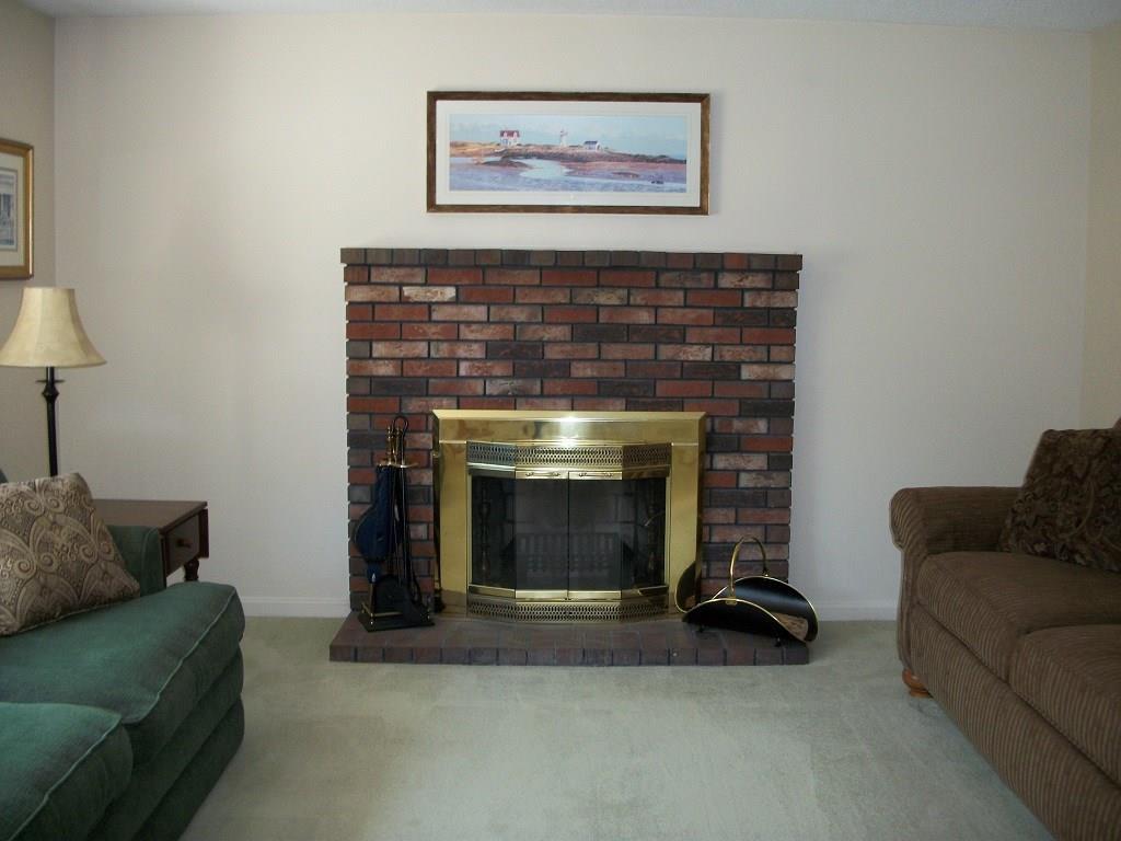 4 Azalea Lane, Unit 2 Windham, ME 04062 - Photo 8 of 33 Relax next to this woodburning...