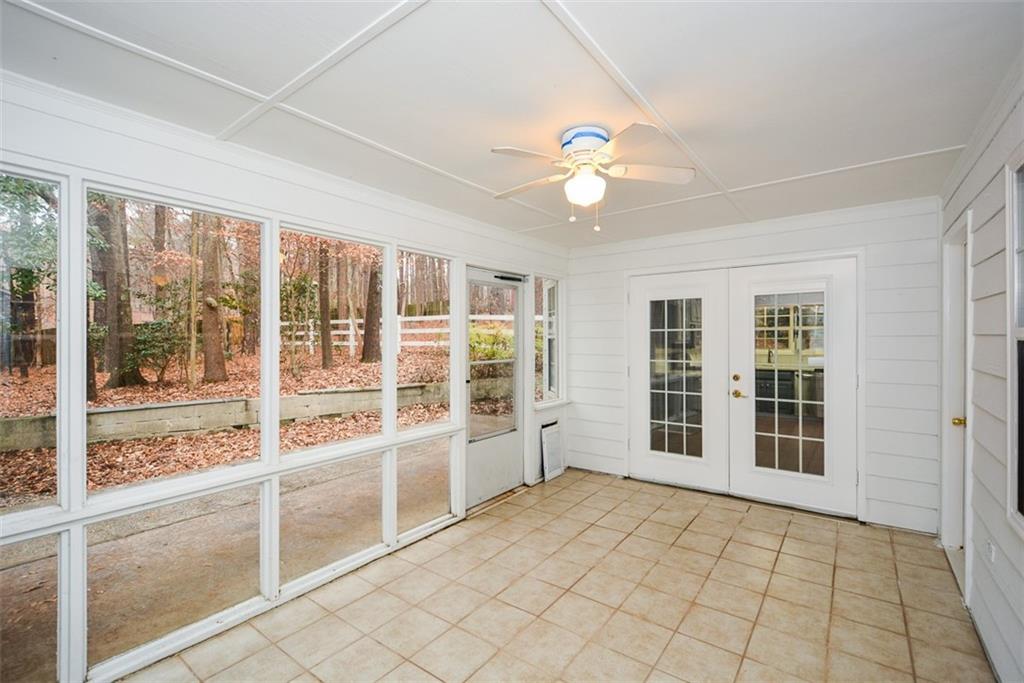 1413 Reed Lane Woodstock, GA 30189 - Photo 12 of 68 a view of an empty room with a window