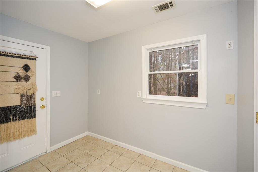 1413 Reed Lane Woodstock, GA 30189 - Photo 29 of 68 a view of an empty room with window