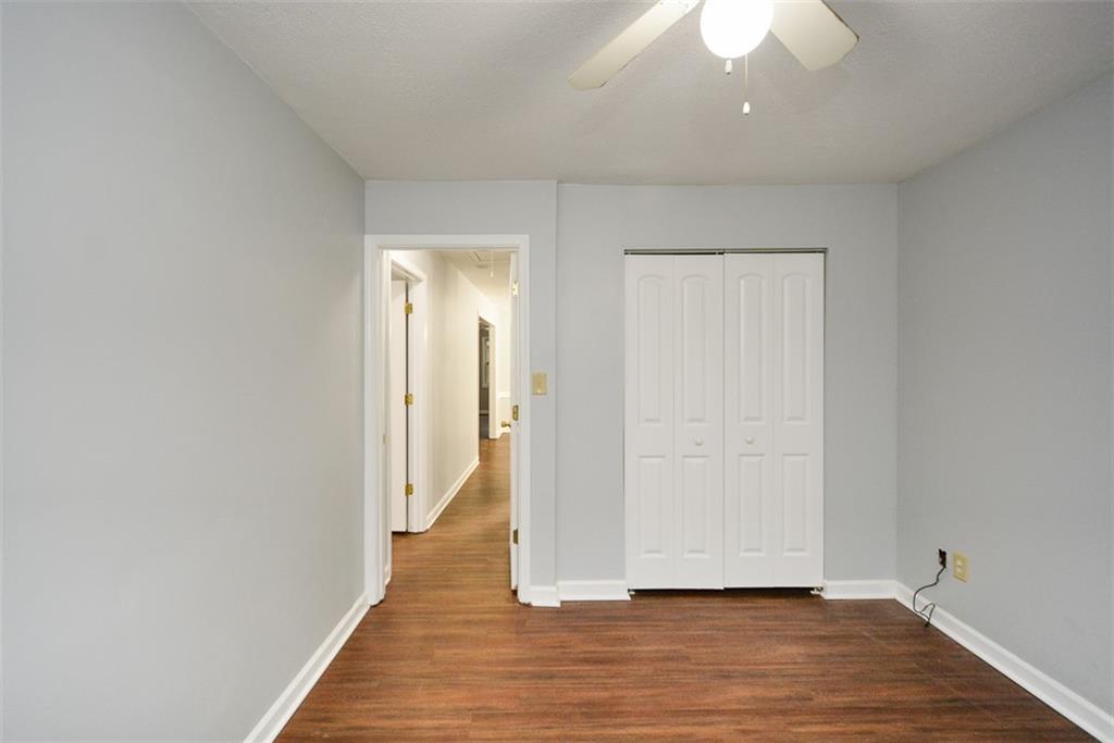1413 Reed Lane Woodstock, GA 30189 - Photo 40 of 68 a view of a room with wooden floor