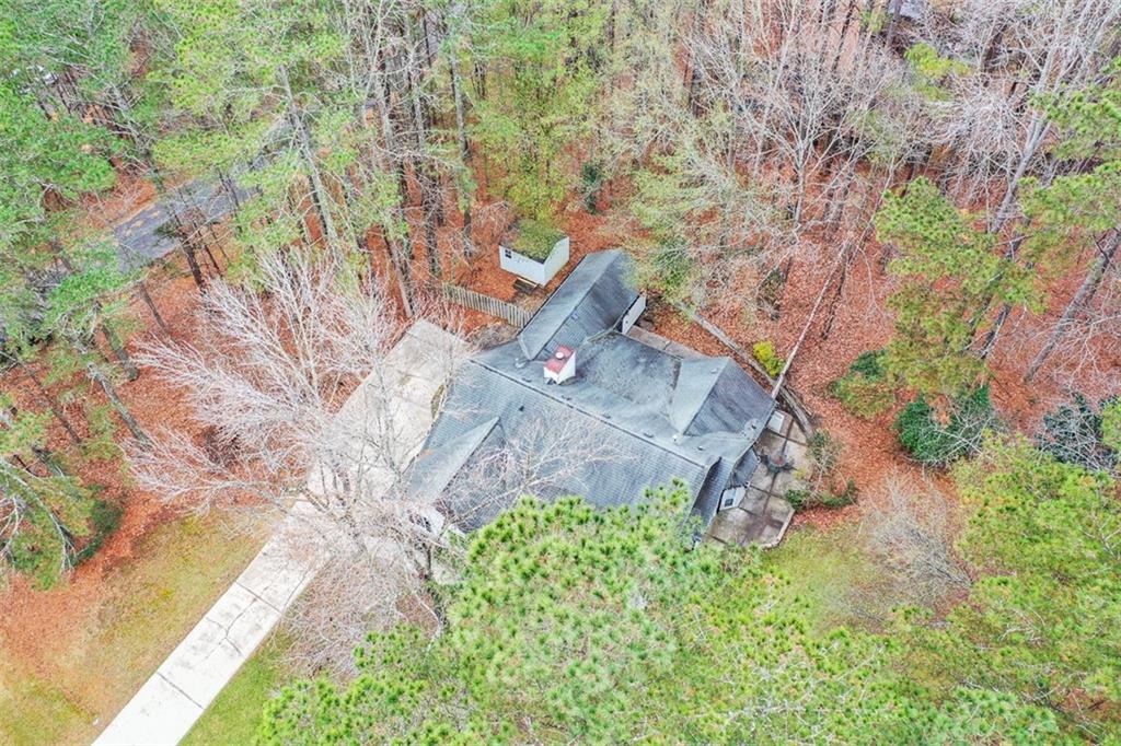 1413 Reed Lane Woodstock, GA 30189 - Photo 58 of 68 a aerial view of a house with a yard
