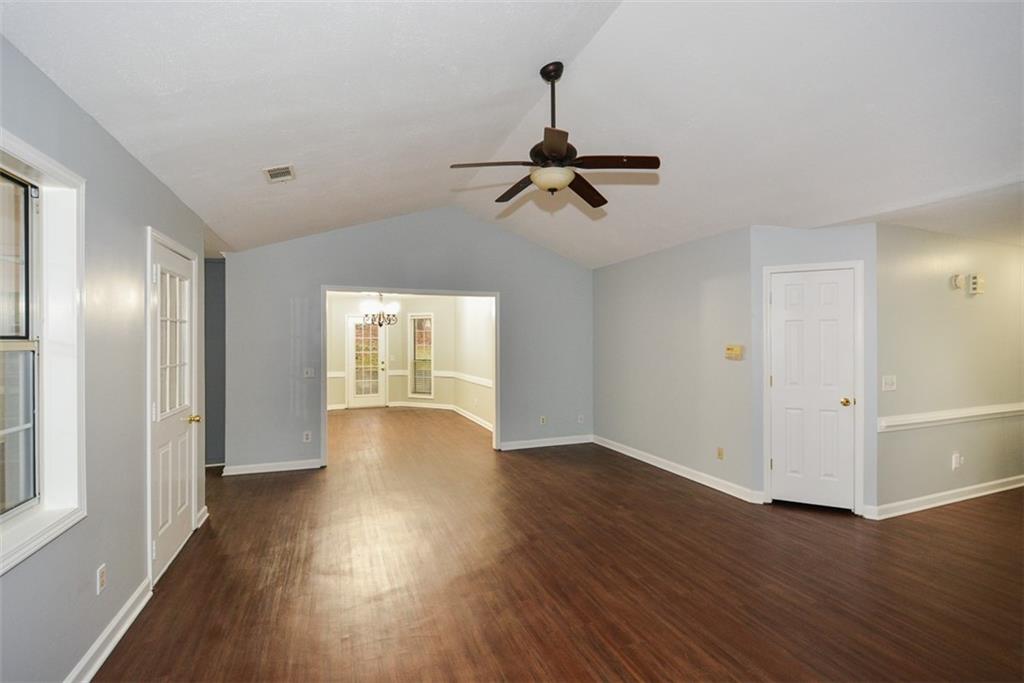 1413 Reed Lane Woodstock, GA 30189 - Photo 10 of 68 a view of empty room with wooden floor and fan