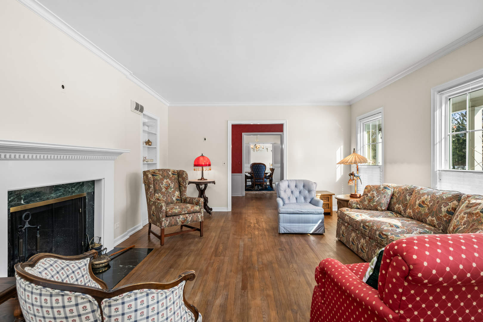 1011 Mohawk Road Wilmette, IL 60091 - Photo 4 of 11 a living room with furniture and a fireplace