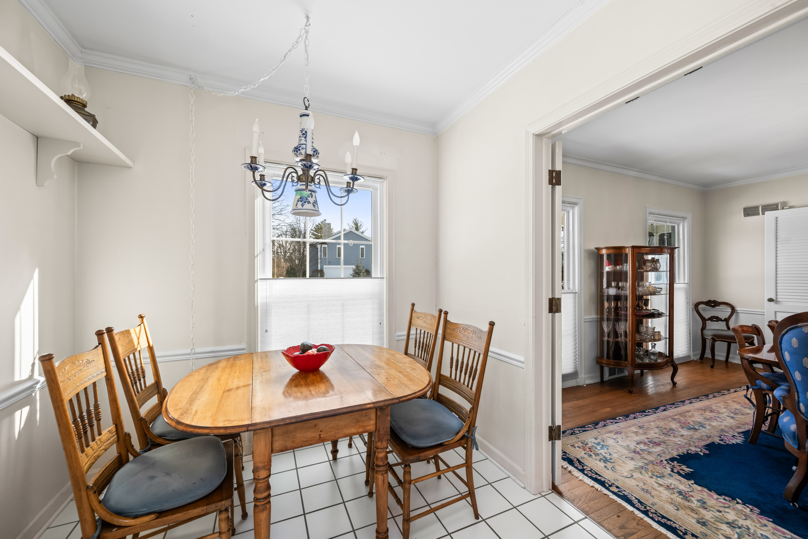 1011 Mohawk Road Wilmette, IL 60091 - Photo 8 of 11 a view of a dining room with furniture and wooden floor