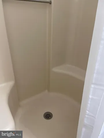 a view of a room with a large window