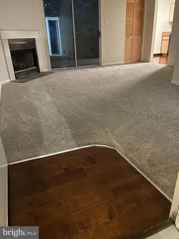 a living room with a fireplace