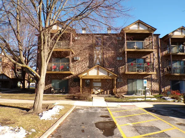 a front view of a building with street view