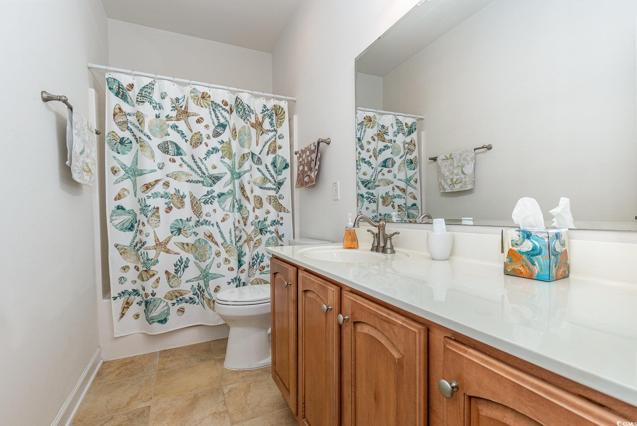 541 Miromar Way Myrtle Beach, SC 29588 - Photo 25 of 37 Bathroom featuring shower / bath combo, toilet, an