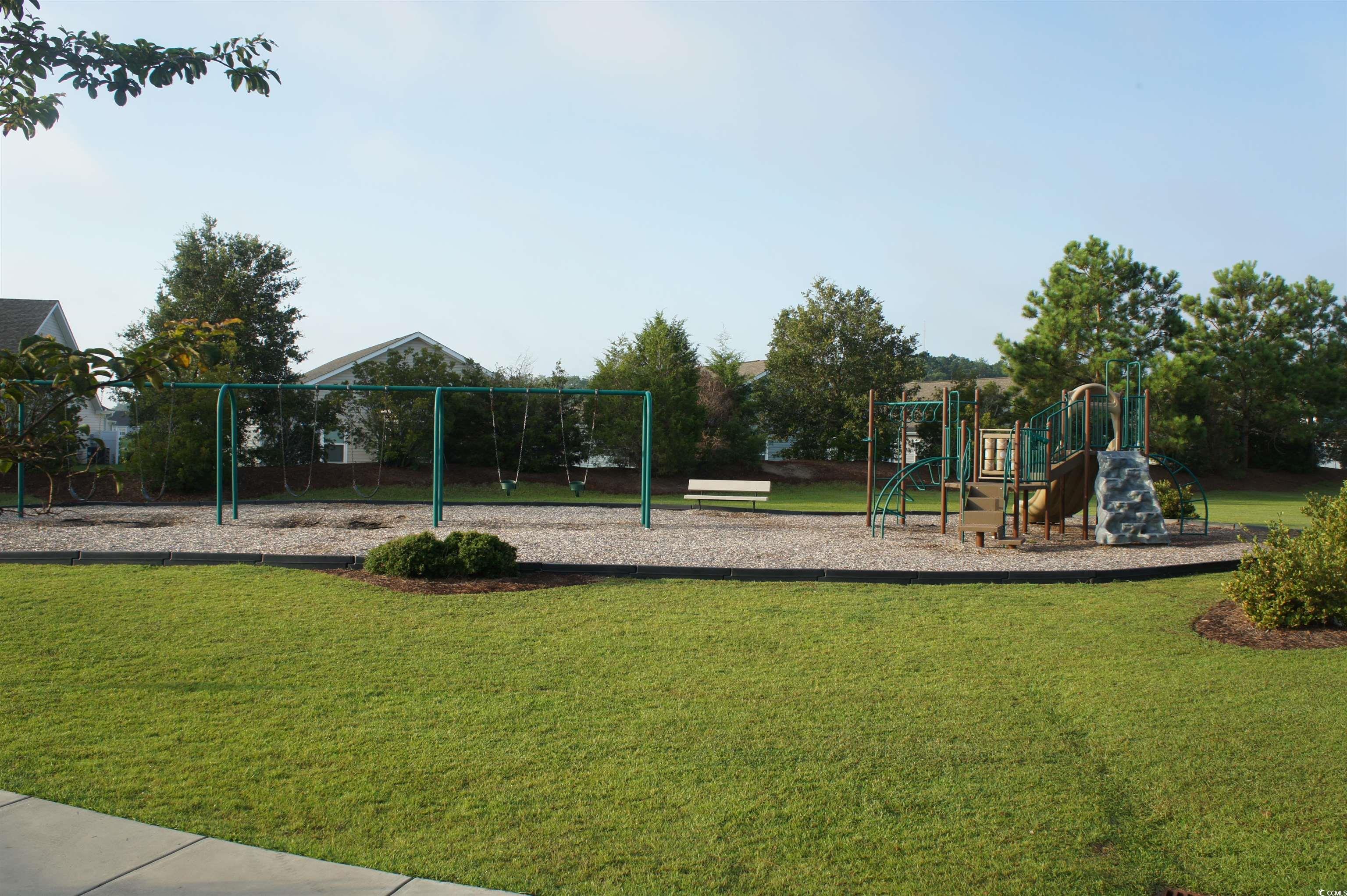 541 Miromar Way Myrtle Beach, SC 29588 - Photo 36 of 37 Community jungle gym featuring a lawn