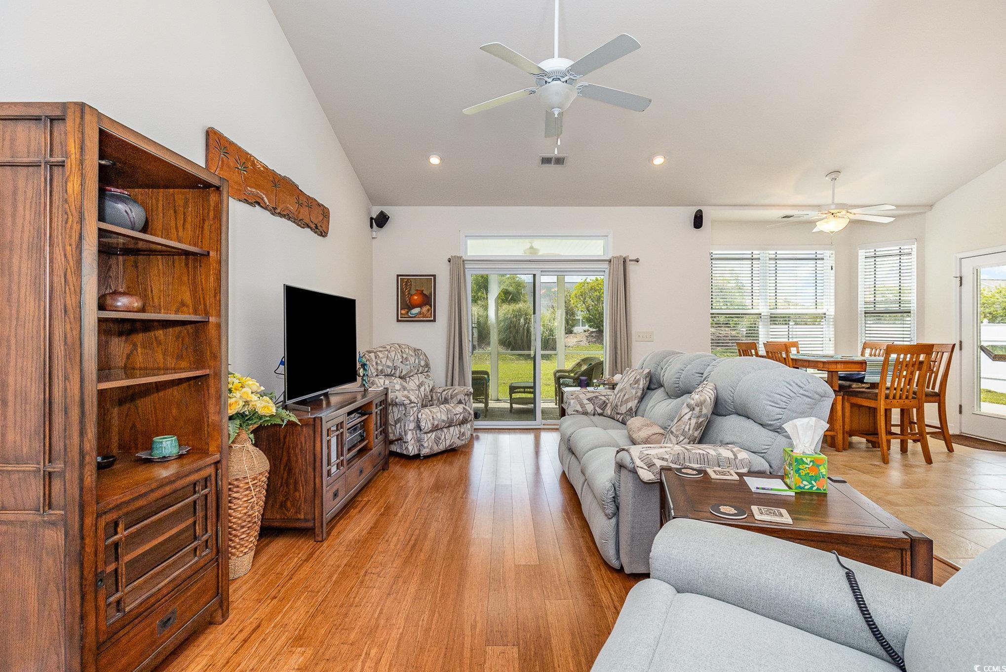 541 Miromar Way Myrtle Beach, SC 29588 - Photo 8 of 37 Living area featuring plenty of natural light, lof