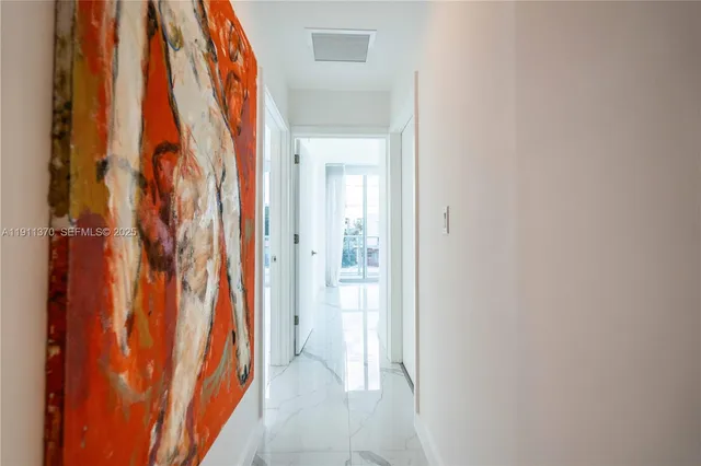 a view of a bathroom with a shower curtain