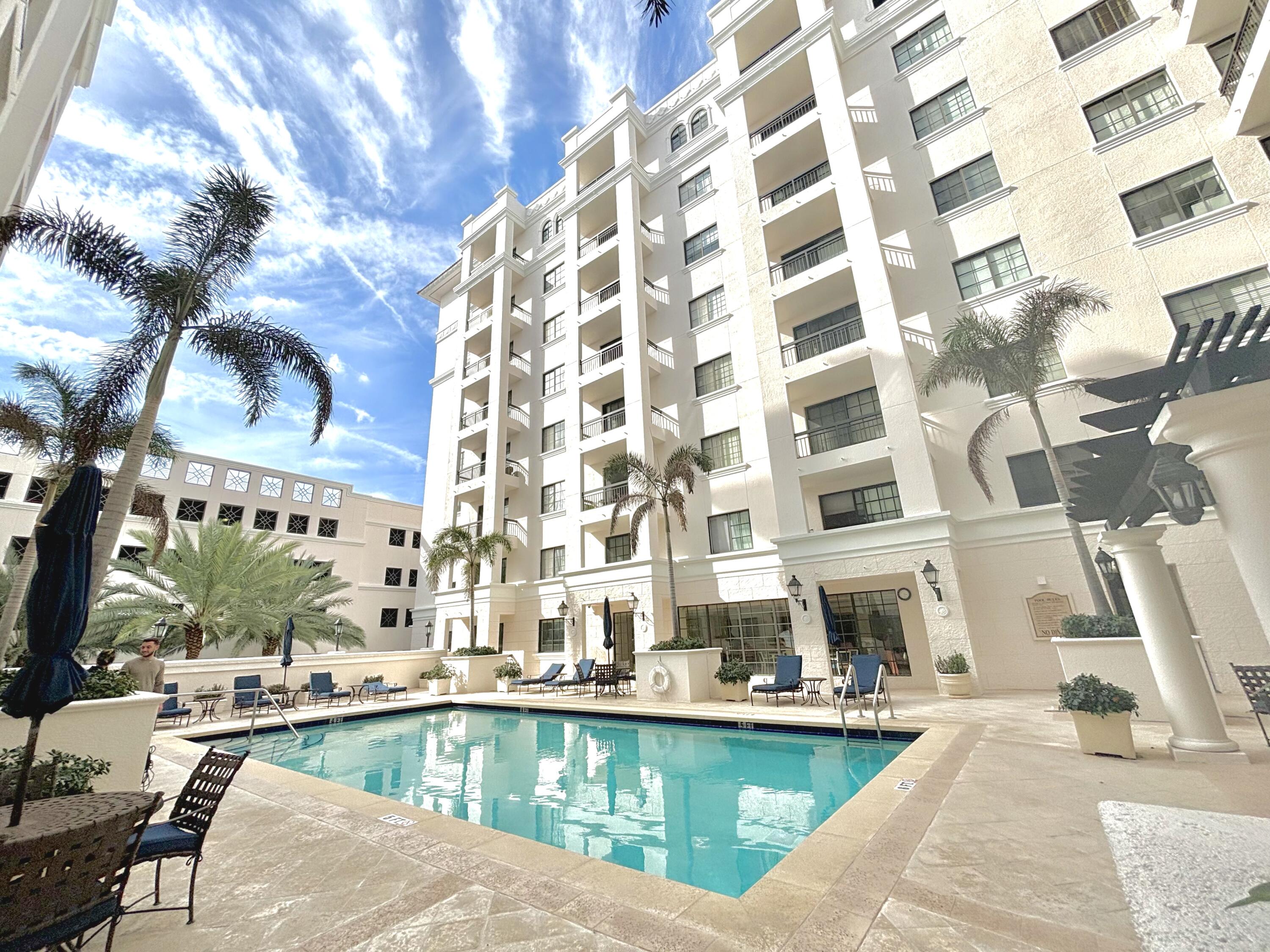 233 South Federal Highway, Unit 603 Boca Raton, FL 33432 - Photo 1 of 18 a view of a swimming pool with a patio