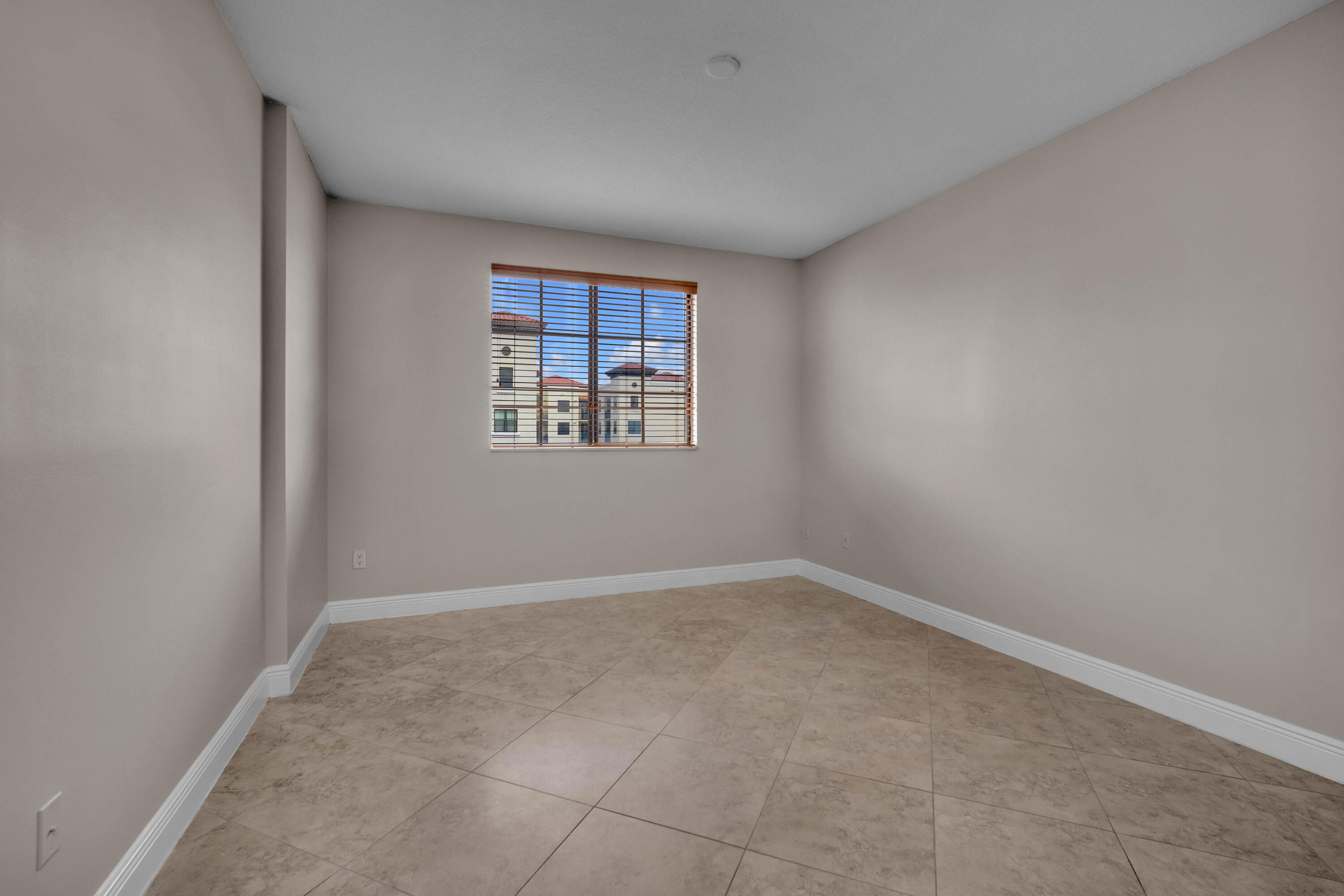 233 South Federal Highway, Unit 603 Boca Raton, FL 33432 - Photo 11 of 18 a view of an empty room with a window