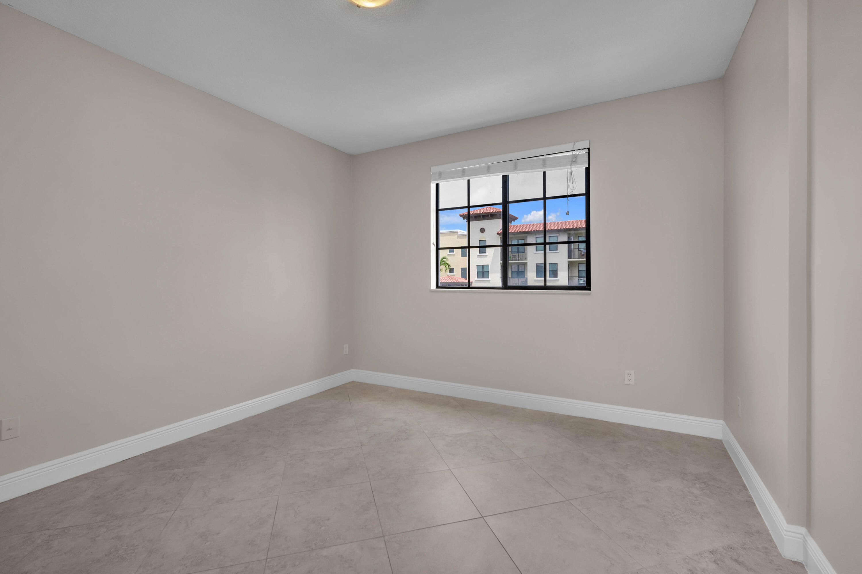 233 South Federal Highway, Unit 603 Boca Raton, FL 33432 - Photo 12 of 18 an empty room with a window