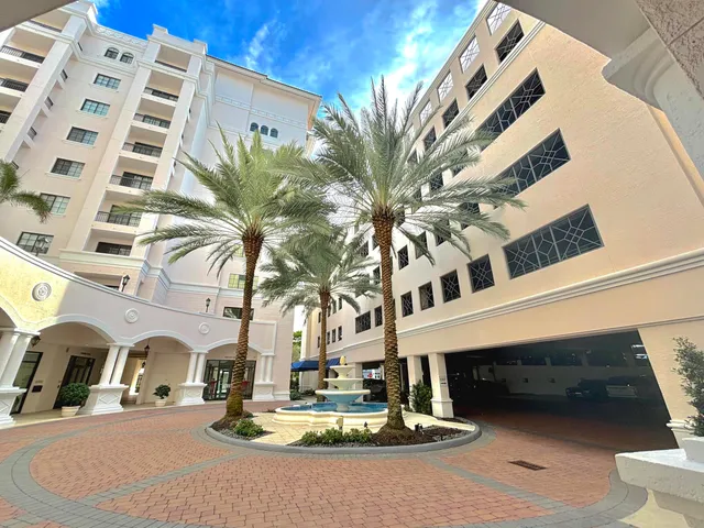 a view of building with parking