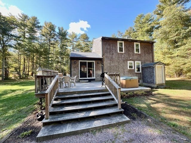 144 Walnut Plain Road Rochester, MA 02770 - Photo 3 of 34 a view of a house with backyard and sitting area