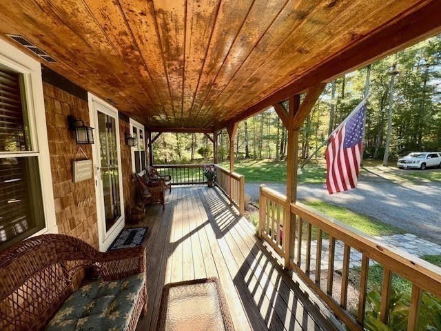 144 Walnut Plain Road Rochester, MA 02770 - Photo 5 of 34 a view of porch with seating area