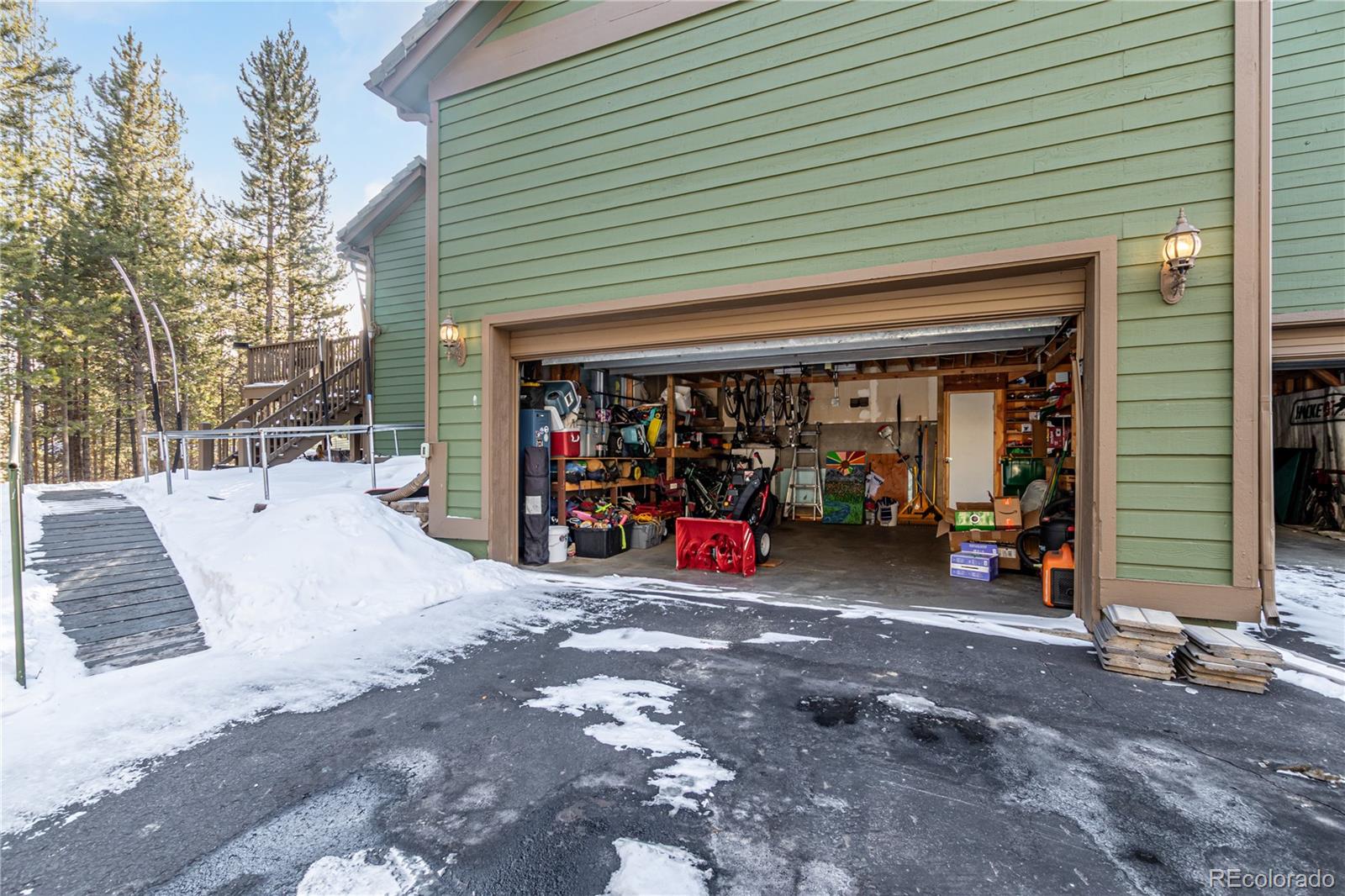 308 Red Hawk Circle Silverthorne, CO 80498 - Photo 41 of 48 a view of a garage with parked cars