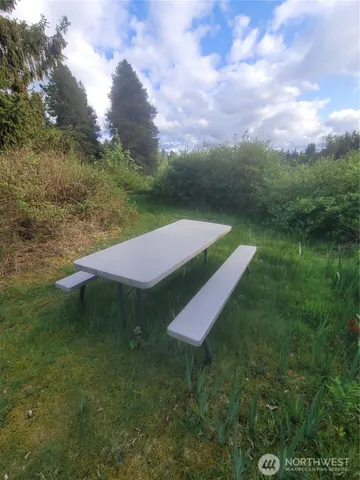 a house view with a garden space