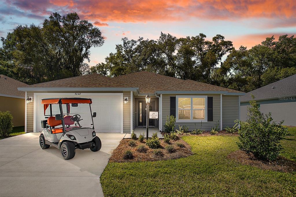 5048 Francis Loop The Villages, FL 32163 - Photo 1 of 1 Front View with Matching Cart.