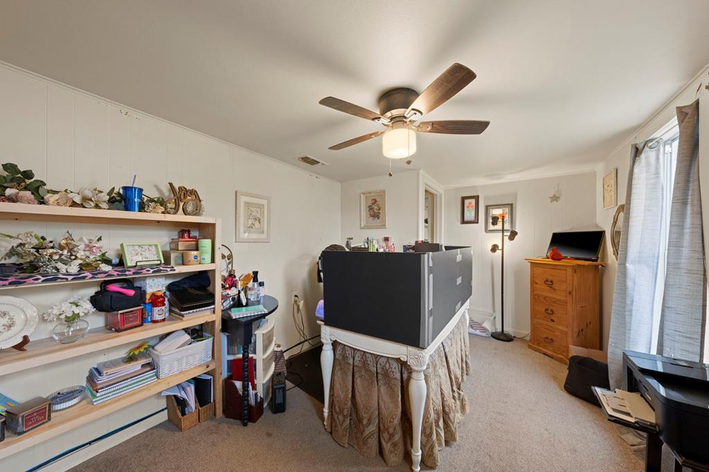 133 Myrtle Avenue Harper, TX 78631 - Photo 14 of 25 a view of a room with baby toys