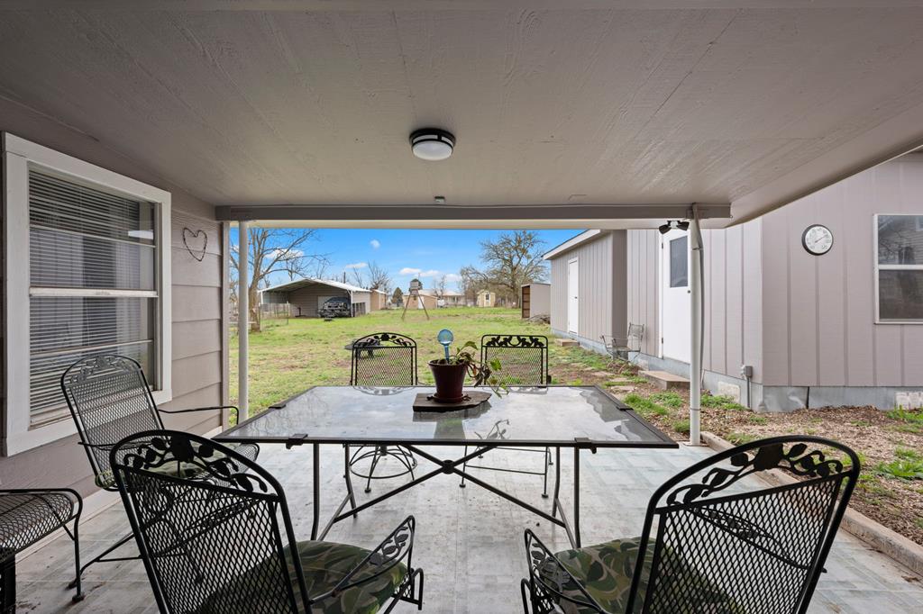 133 Myrtle Avenue Harper, TX 78631 - Photo 16 of 25 a view of a dining room with furniture window and outside view