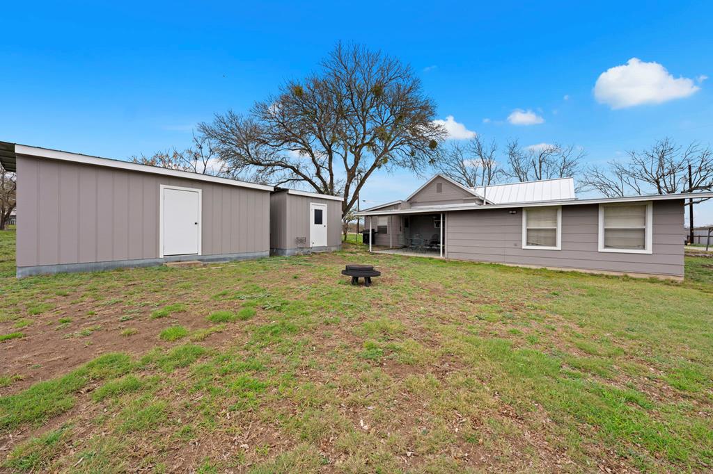 133 Myrtle Avenue Harper, TX 78631 - Photo 19 of 25 a backyard of a house