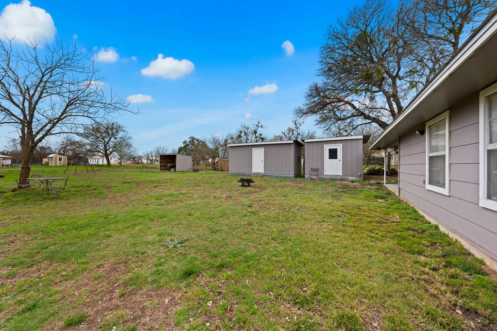 133 Myrtle Avenue Harper, TX 78631 - Photo 20 of 25 a view of a house with a yard