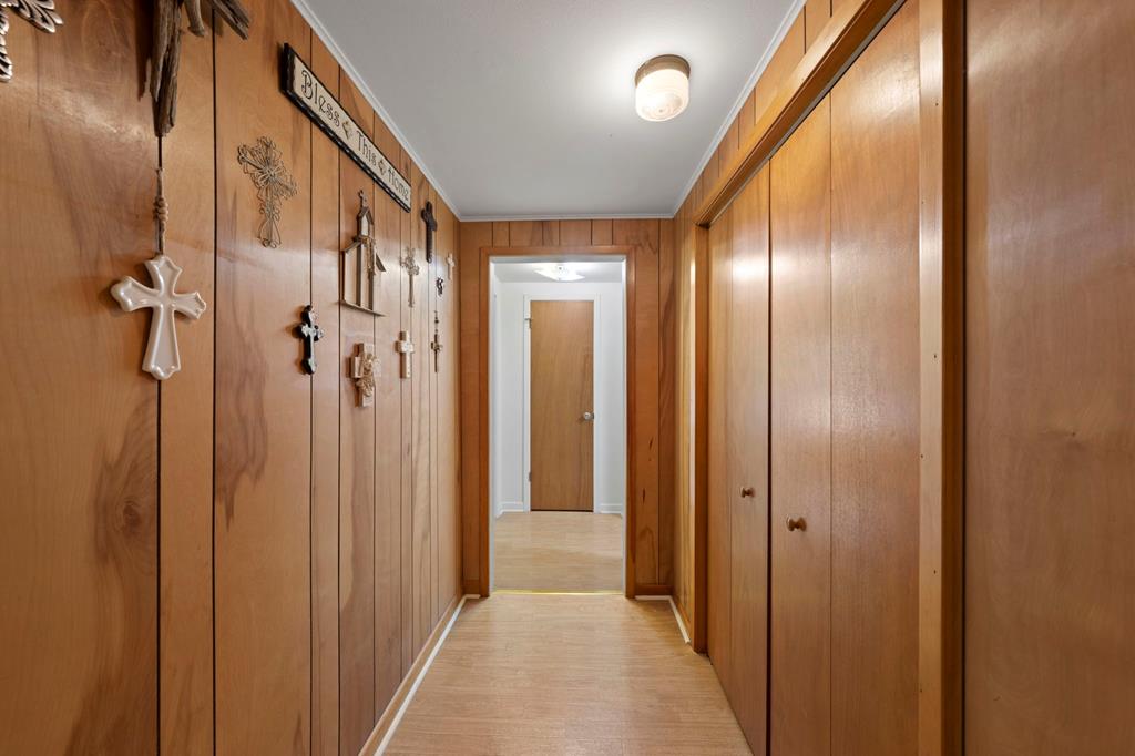 133 Myrtle Avenue Harper, TX 78631 - Photo 8 of 25 a view of a hallway with wooden floor