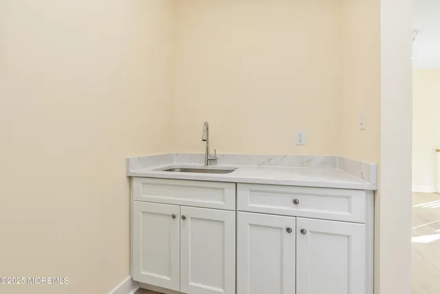 a big room with sliding glass door and glass door