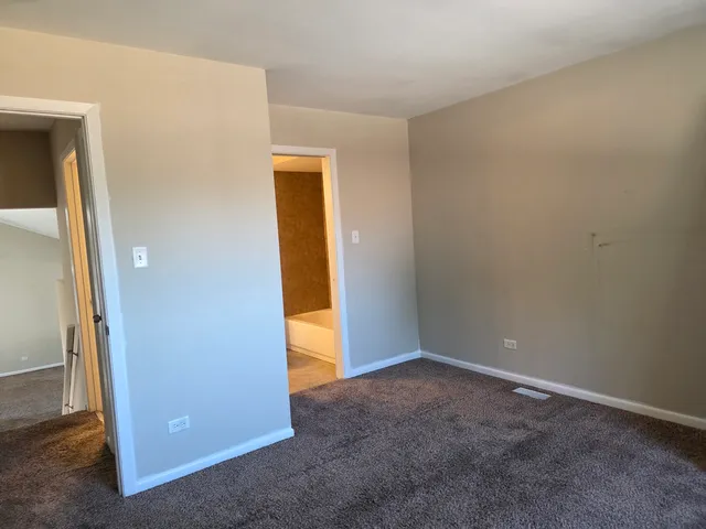 an empty room with closet