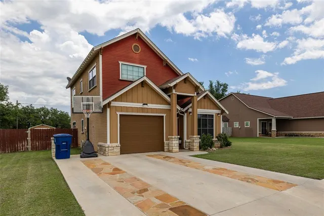 a front view of a house with yard