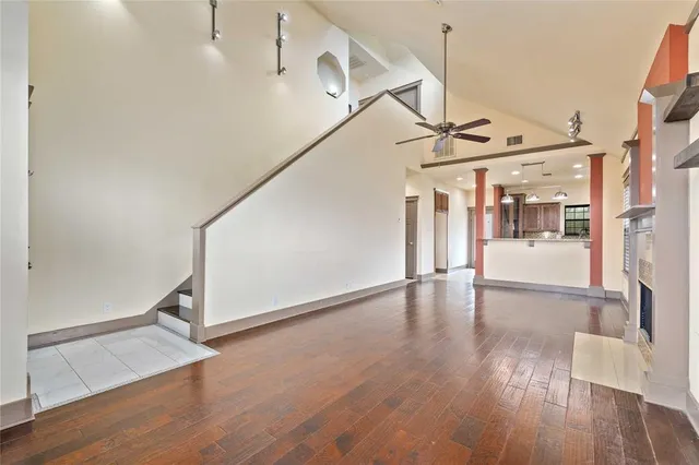 a view of an entryway with wooden floor