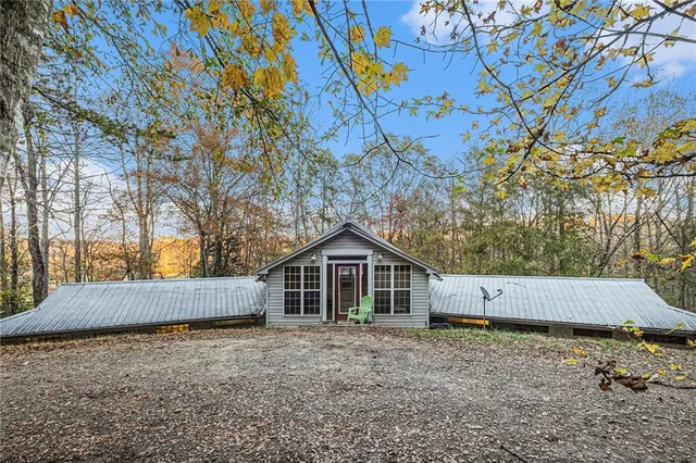 a house with wooden fence