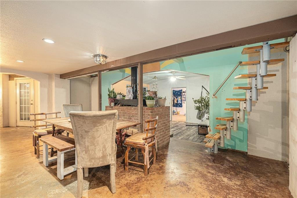 880 Golf Course Road Demorest, GA 30535 - Photo 11 of 37 a view of a dining room with furniture window and outside view