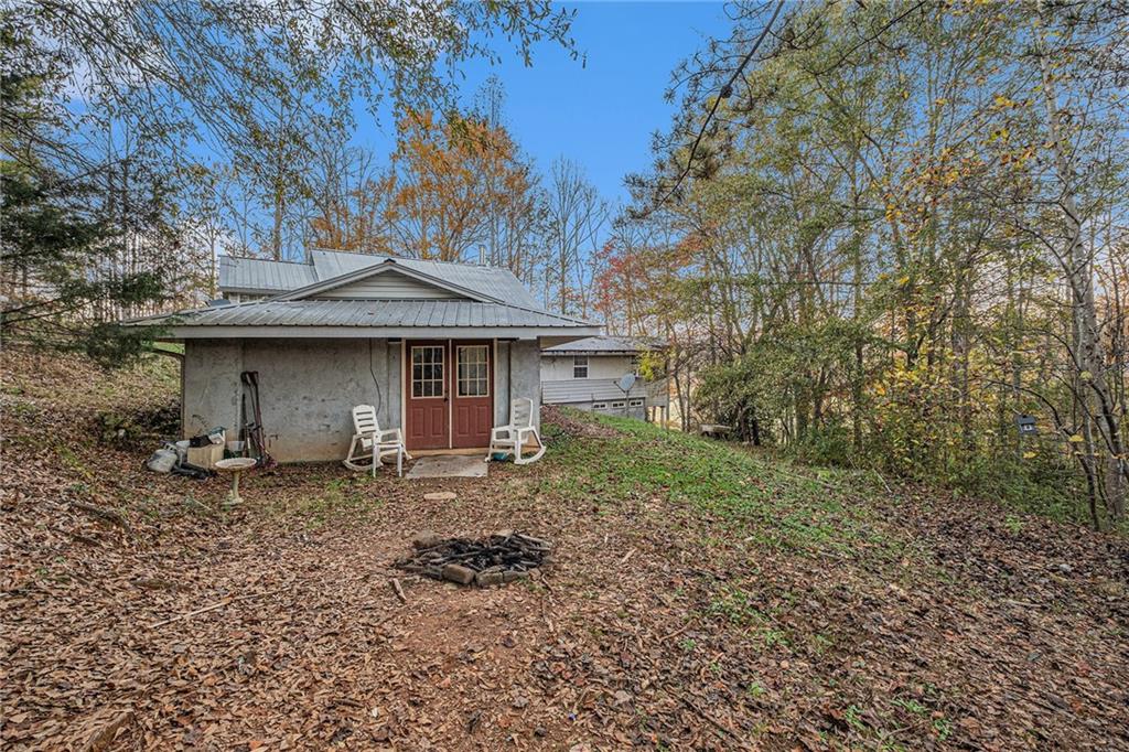 880 Golf Course Road Demorest, GA 30535 - Photo 32 of 37 a front view of a house with garden