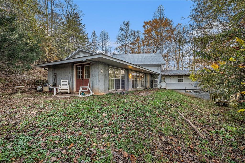 880 Golf Course Road Demorest, GA 30535 - Photo 33 of 37 a view of a house with a yard